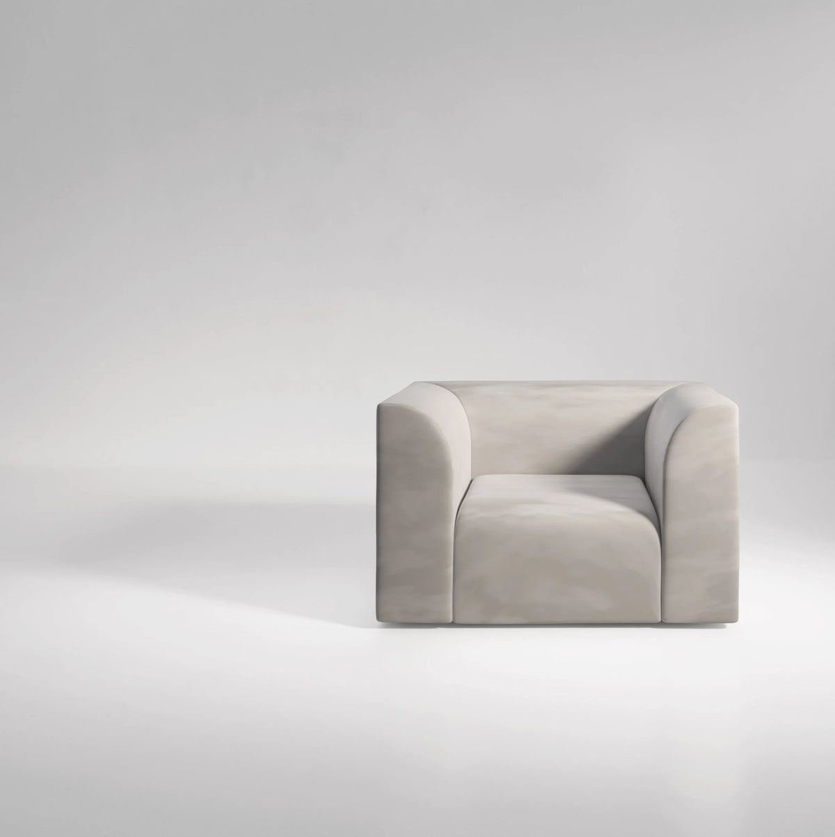 Archi Armchair in light grey upholstery, three-quarter view on grey