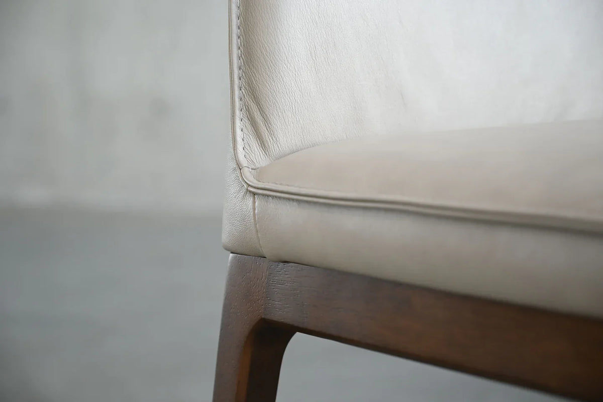 Holt chair seat edge and solid wood leg detail