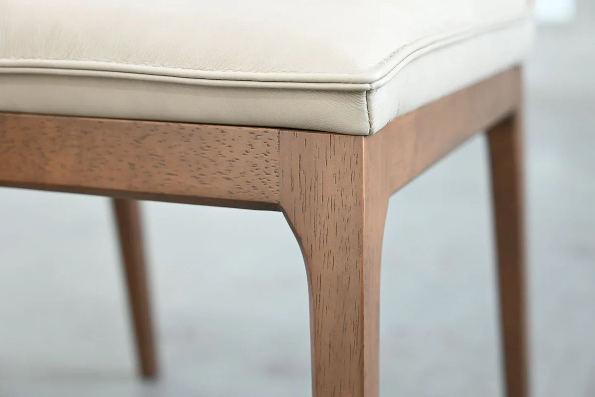 Holt Dining Chair seat stitching above the solid wood frame