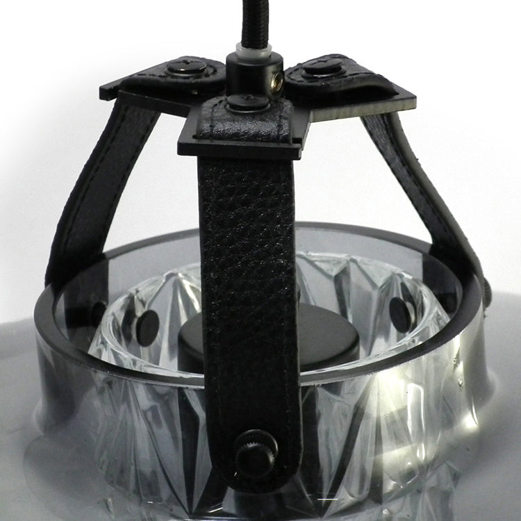 Addicted To Us Pendant Light Black close-up of black leather straps holding the faceted glass shade