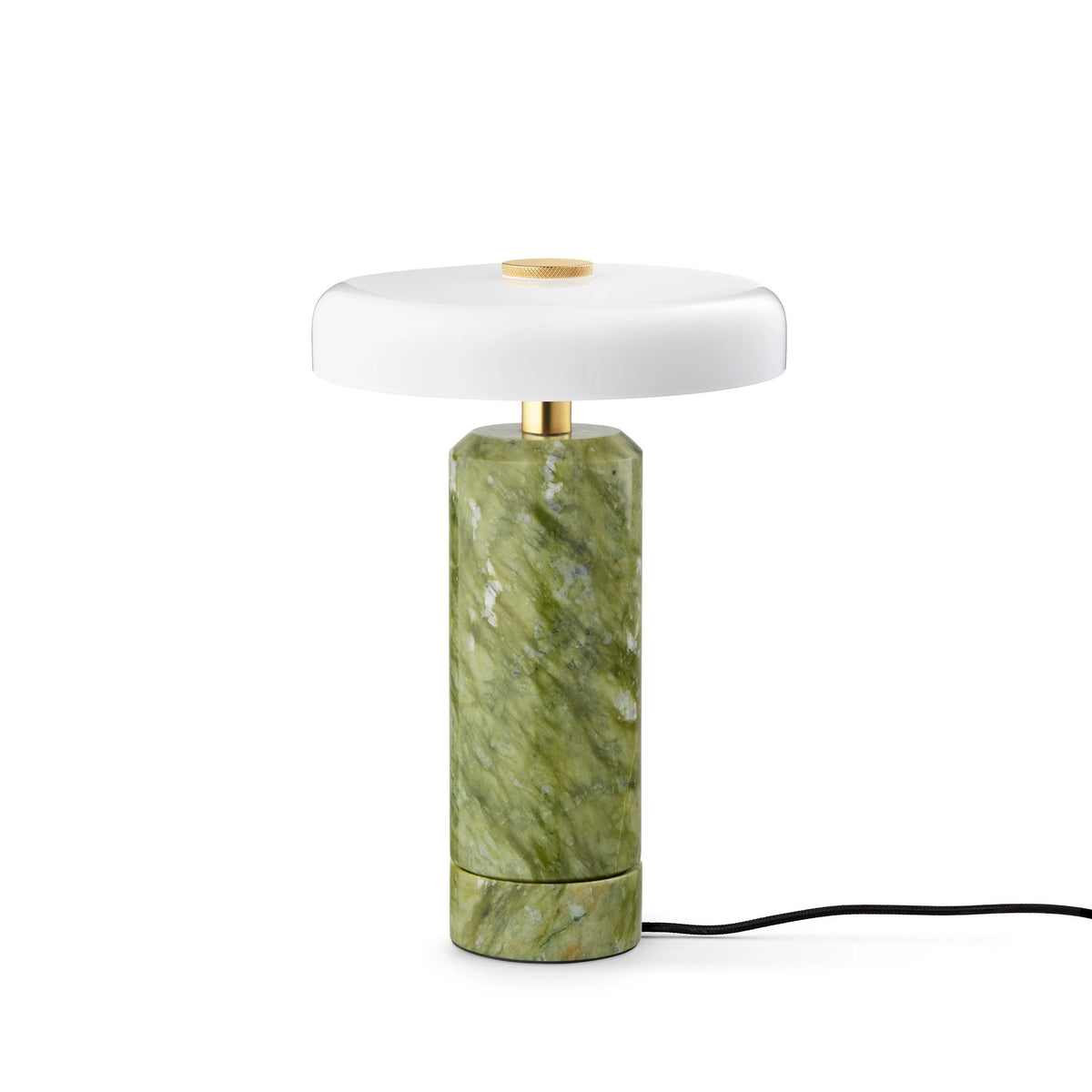 Trip Table Lamp in Apple and Opal on its charging base with cable