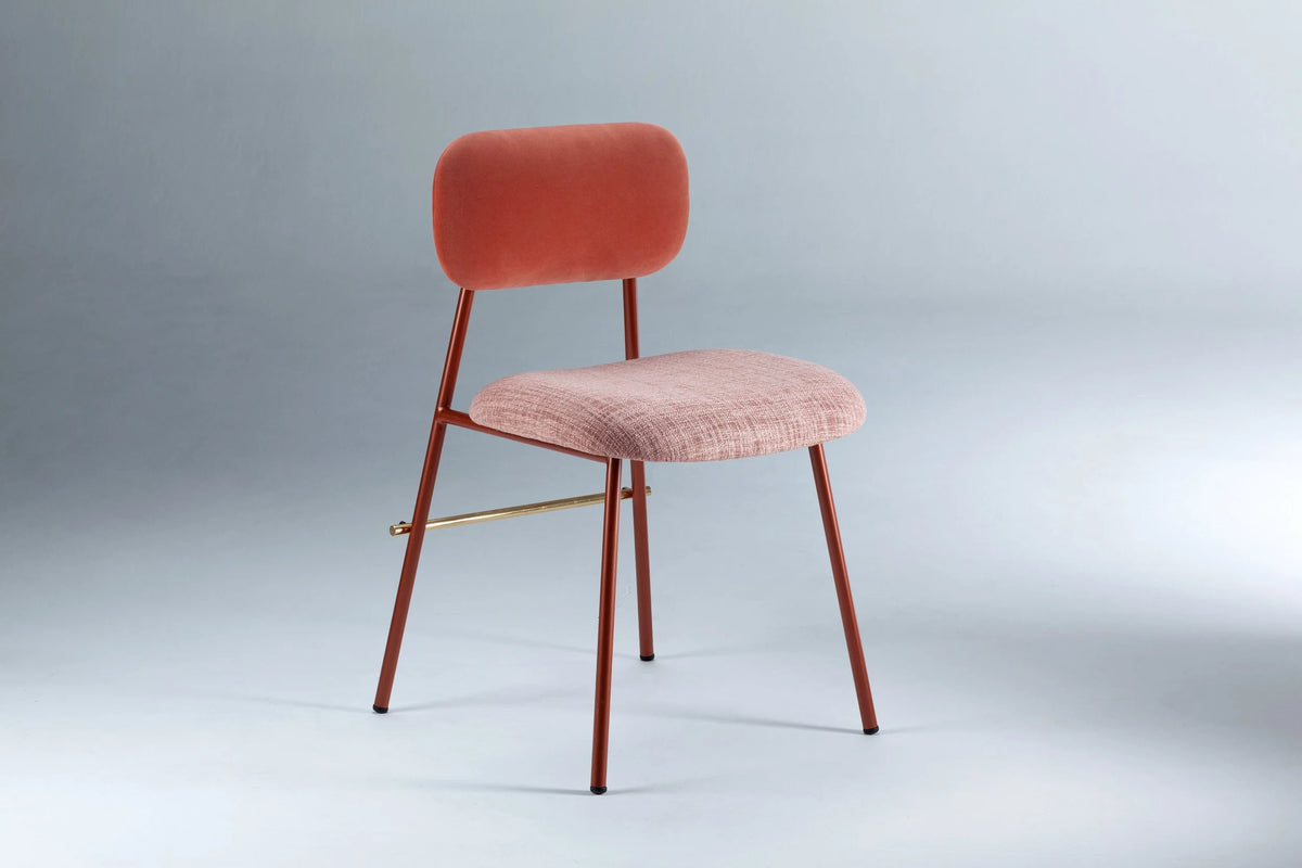 Miami Dining Chair with coral velvet back and pink woven seat, front three-quarter view