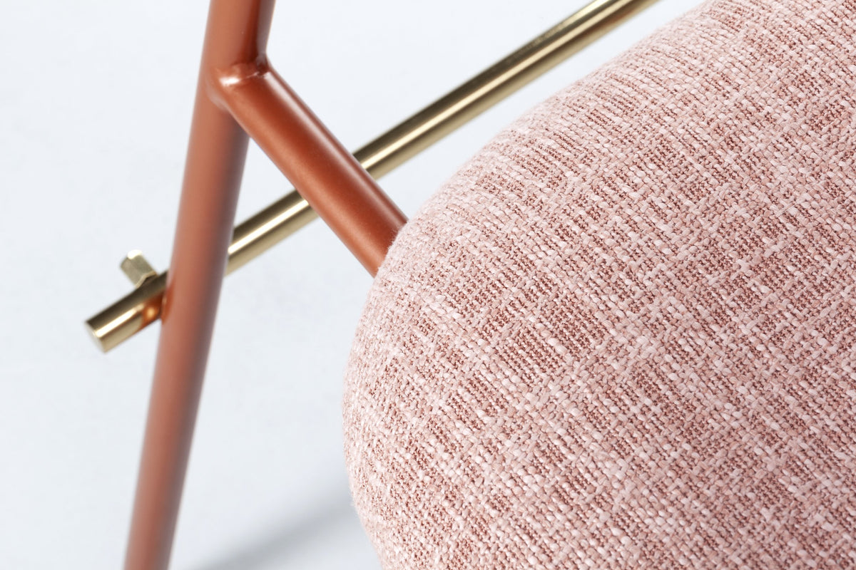 Miami Dining Chair, close-up of the pink woven seat and brass back rail