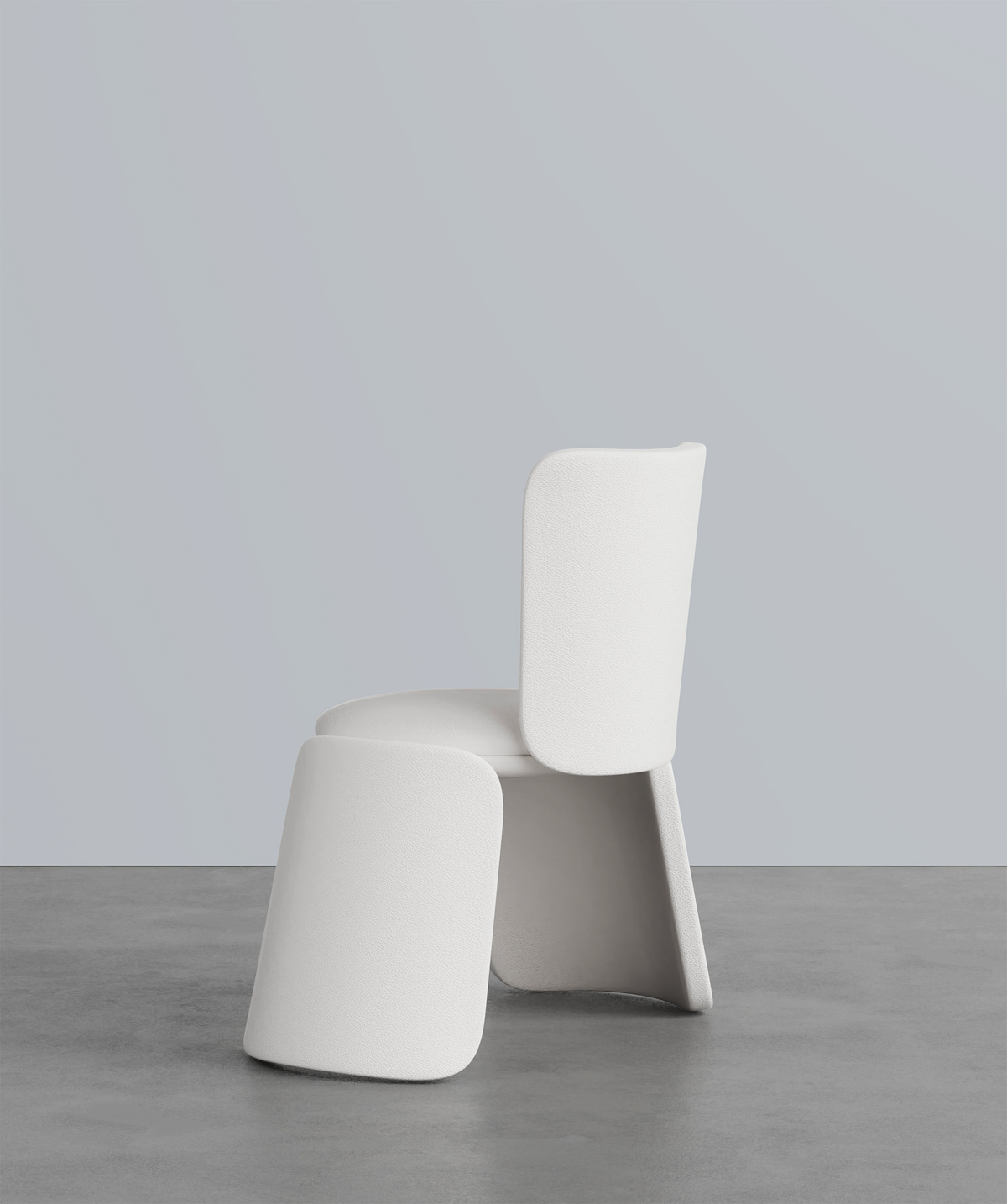 Inge Chair in off-white, front view showing sculpted legs