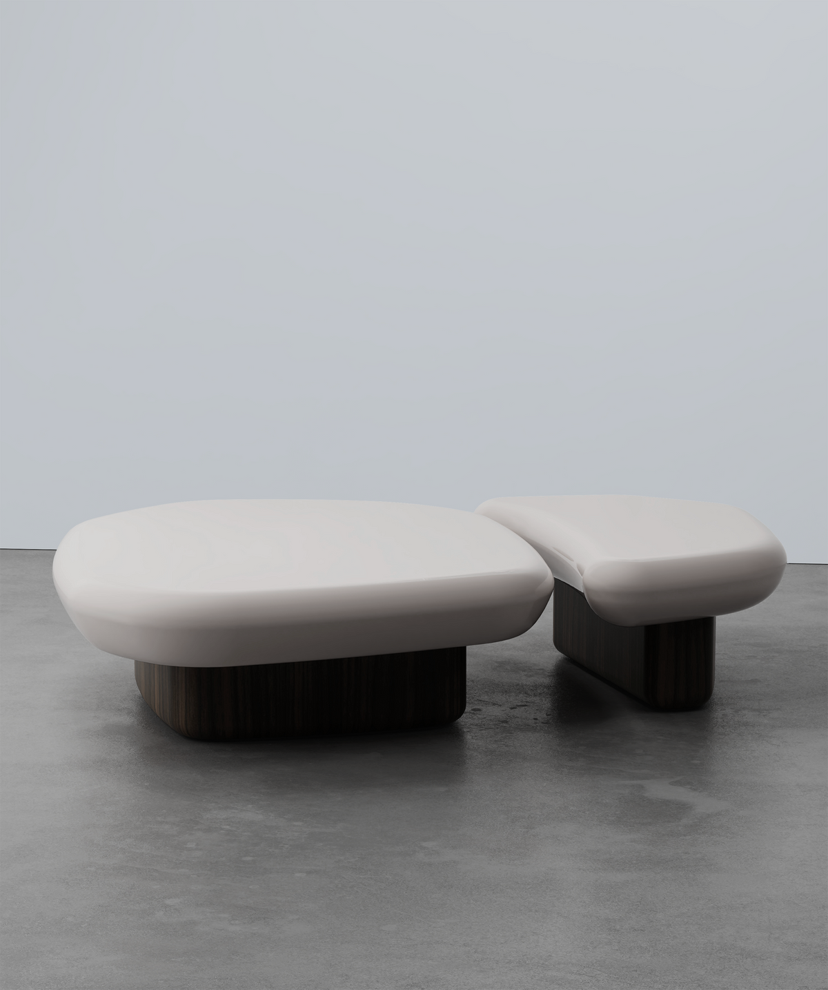 Kawa Coffee Tables in off-white high gloss on a concrete floor
