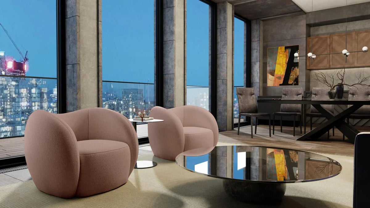 Dune Swivel Lounge Chair pair in Dusty Rose beside a glass coffee table with city view