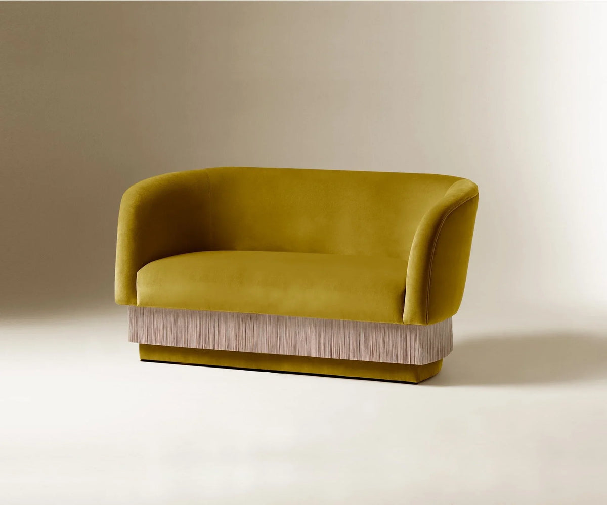La Folie Sofa in Safran velvet with fringe, compact side angle