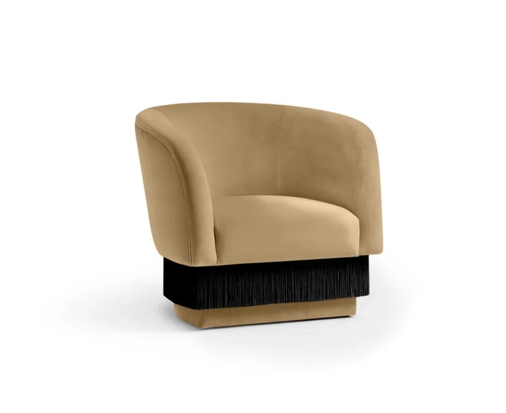 La Folie Armchair in Fine - Dune sand velvet with black fringe base