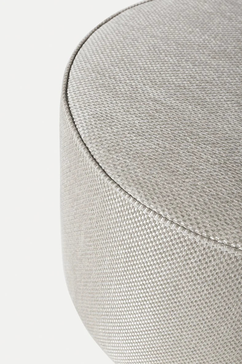 Muffin Pouf close-up of woven upholstery and piped edge