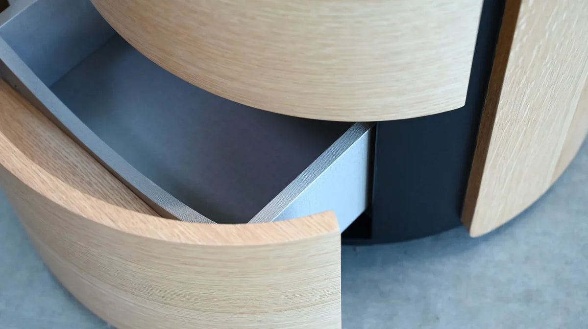 Burrow Night Table close-up of curved oak drawer pulled open