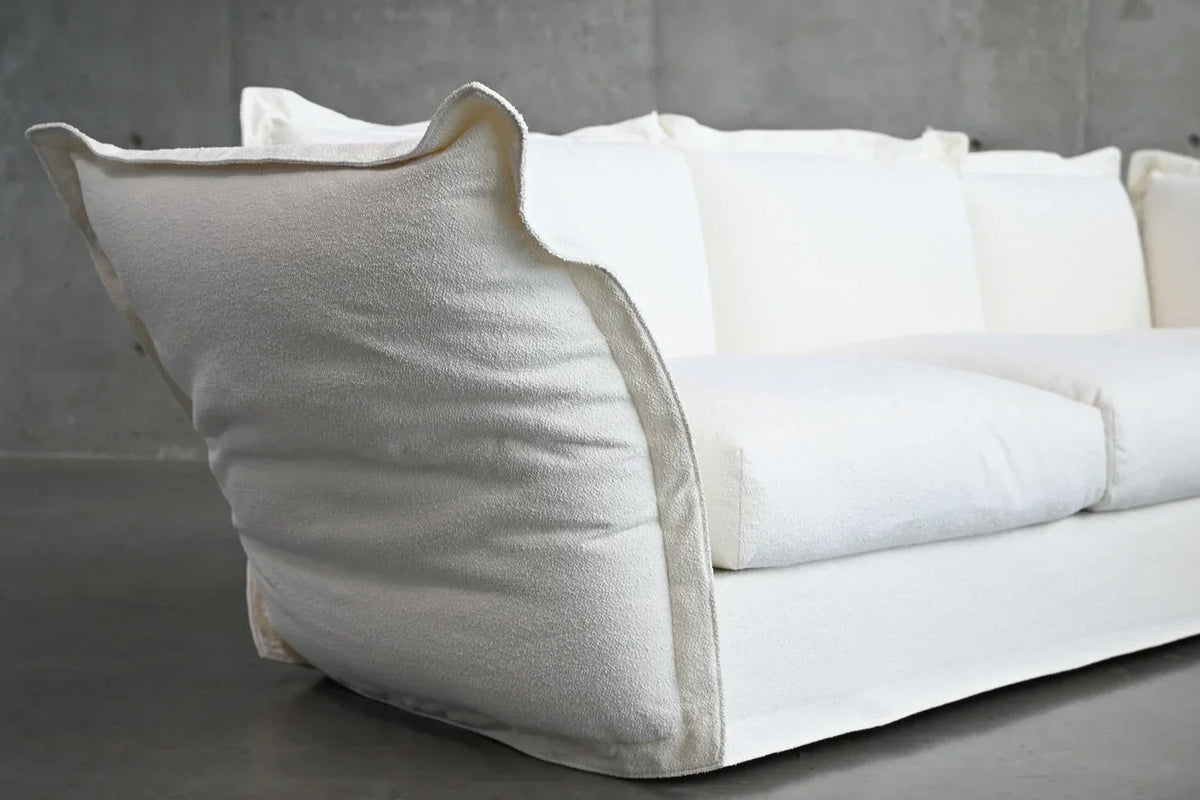 Willow Sectional Sofa in white, close-up of the flared arm and cushions