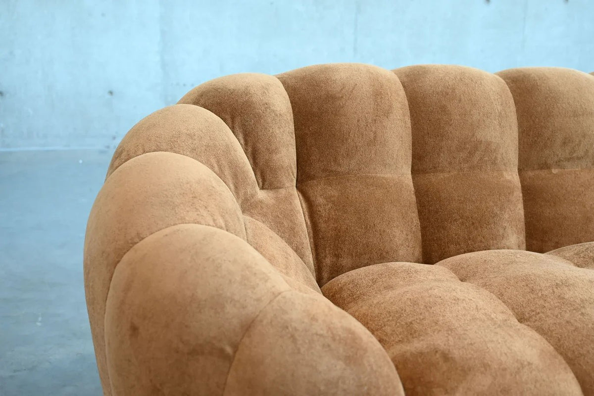 Puffin Sofa detail of the curved channelled back and arm