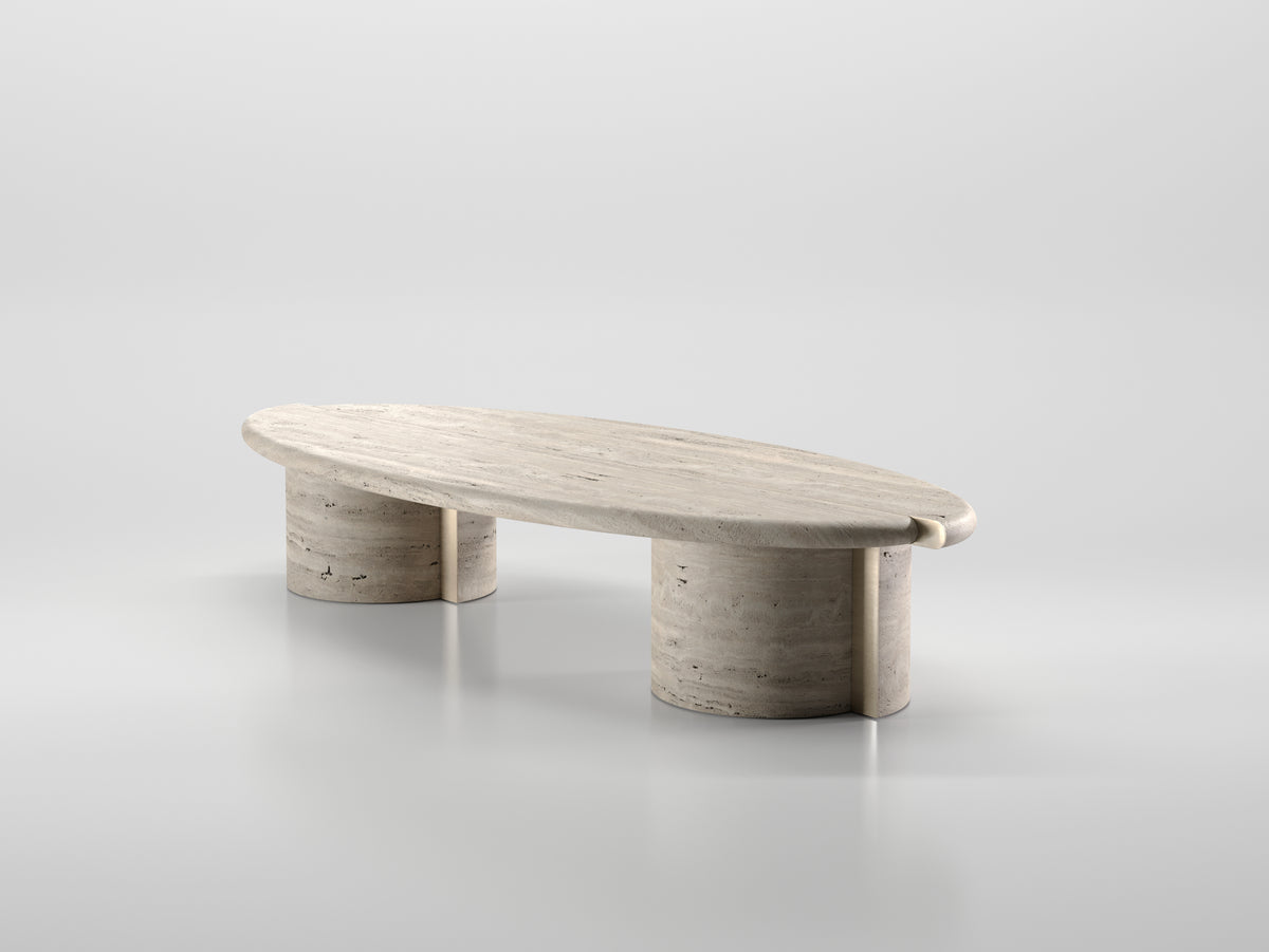 Tayma X Coffee Table in travertine finish on a grey backdrop