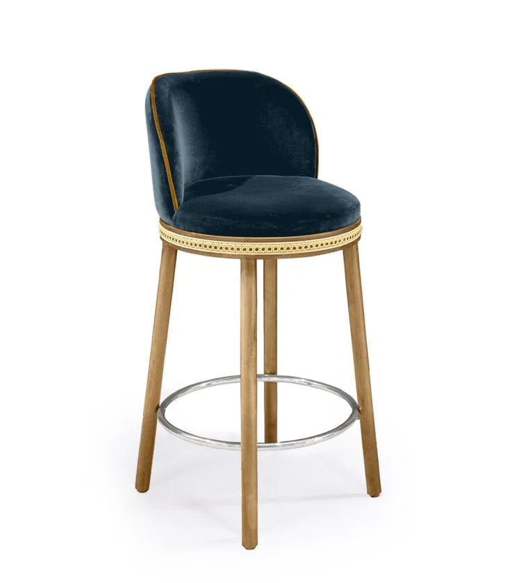 Alma Counter Stool in Mediterranee velvet with natural oak legs and polished nickel footrest