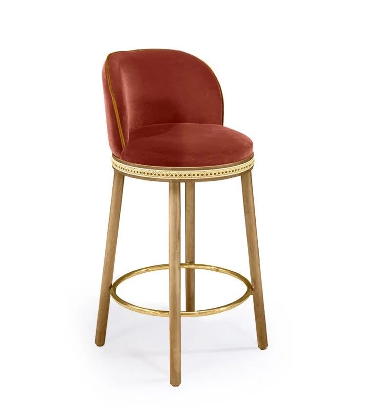 Alma Counter Stool in Peche velvet with natural oak legs and satin brass footrest