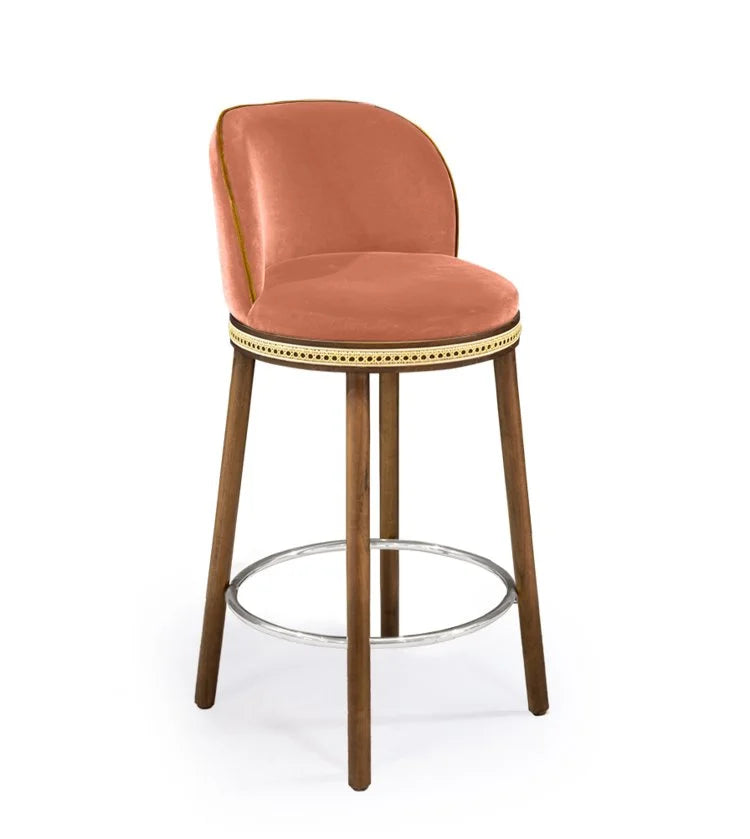Alma Counter Stool in Powder velvet with natural walnut legs and satin nickel footrest