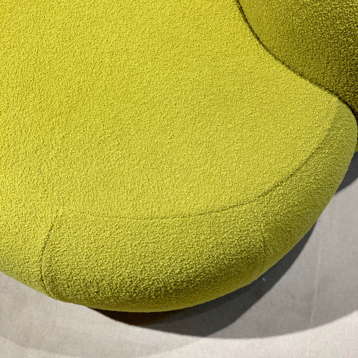 B-15 Z Lounge Chair close-up of chartreuse bouclé upholstery on the curved seat