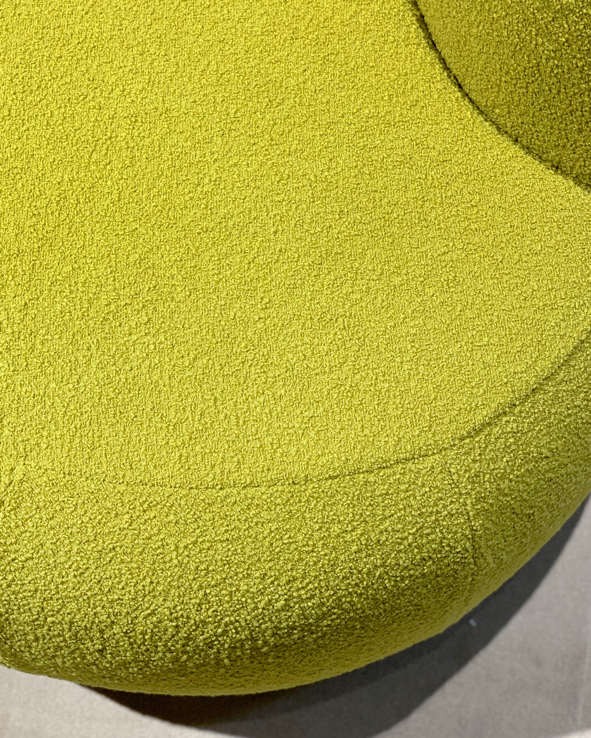 B-15 Z Lounge Chair chartreuse bouclé detail of the rounded seat edge