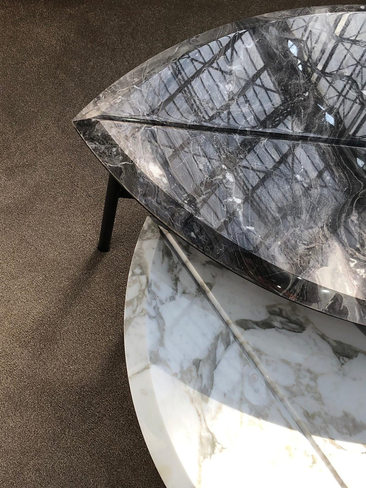 Book One & Two Coffee Table close-up of overlapping marble tops