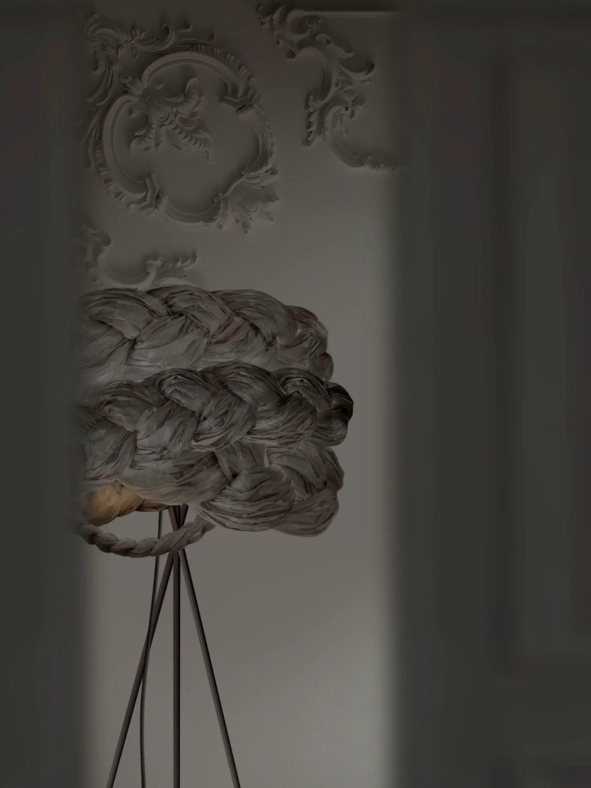 Mammalampa Bride Floor Lamp Graphite - Medium, braided graphite paper shade on a tripod in a dark room