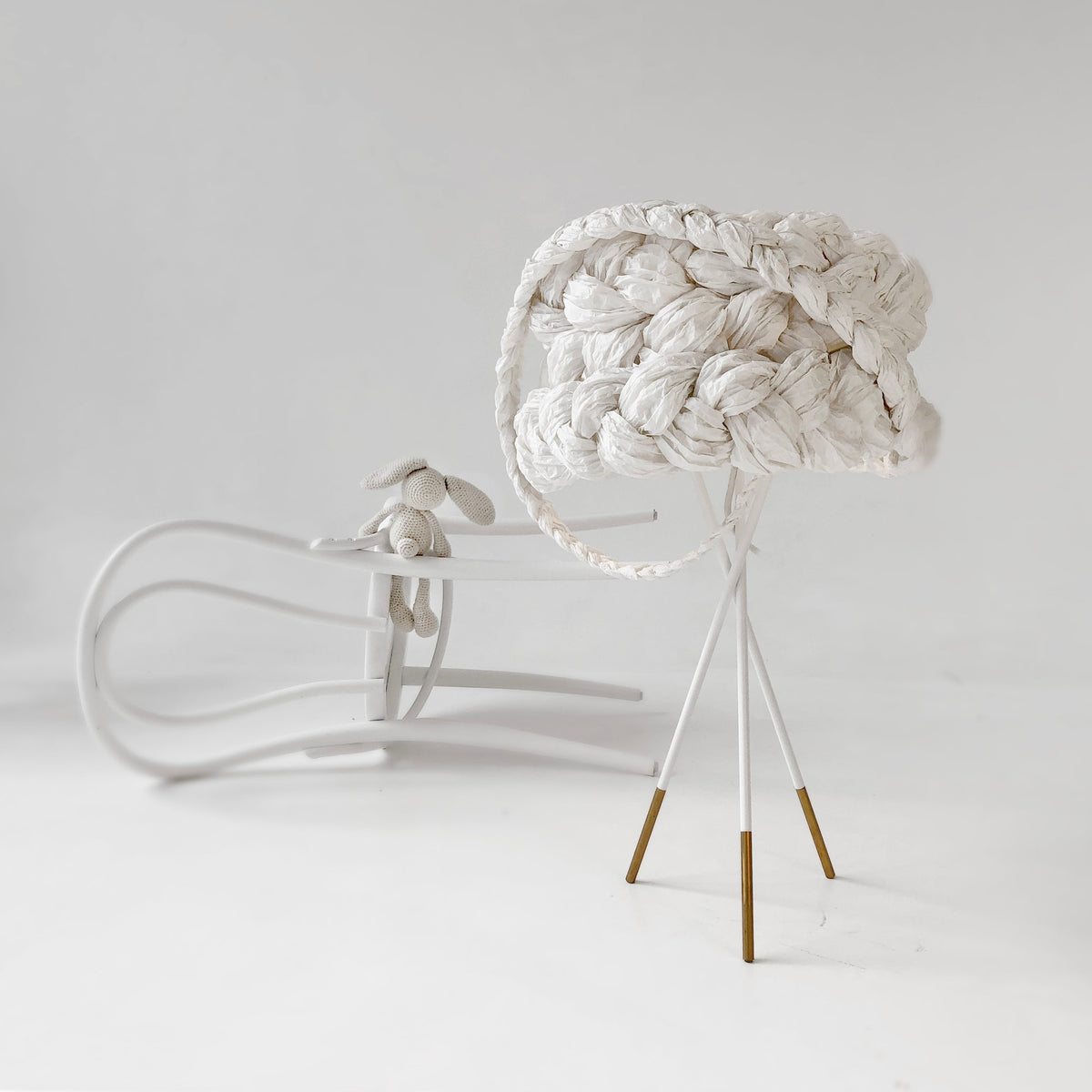 Mammalampa Bride Table Lamp White beside a curved white bench