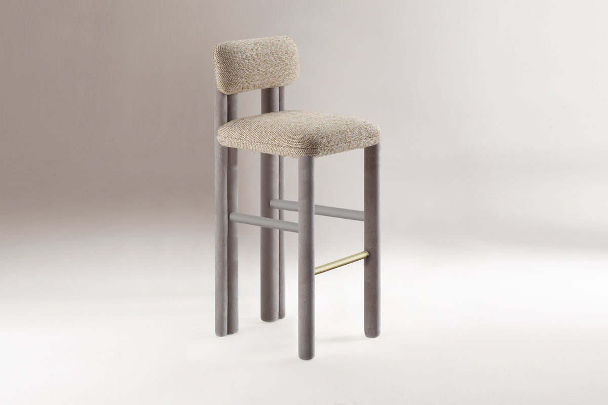 Camelia Counter Stool in boucle with grey frame, side three-quarter view
