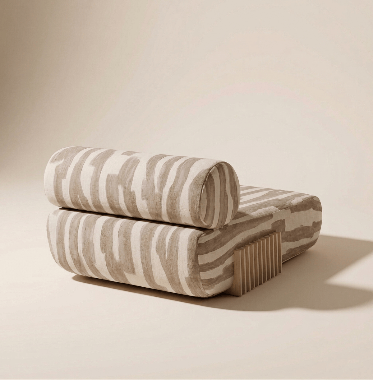 Carmel Chaise Lounge in striped fabric, back three-quarter view with wood base