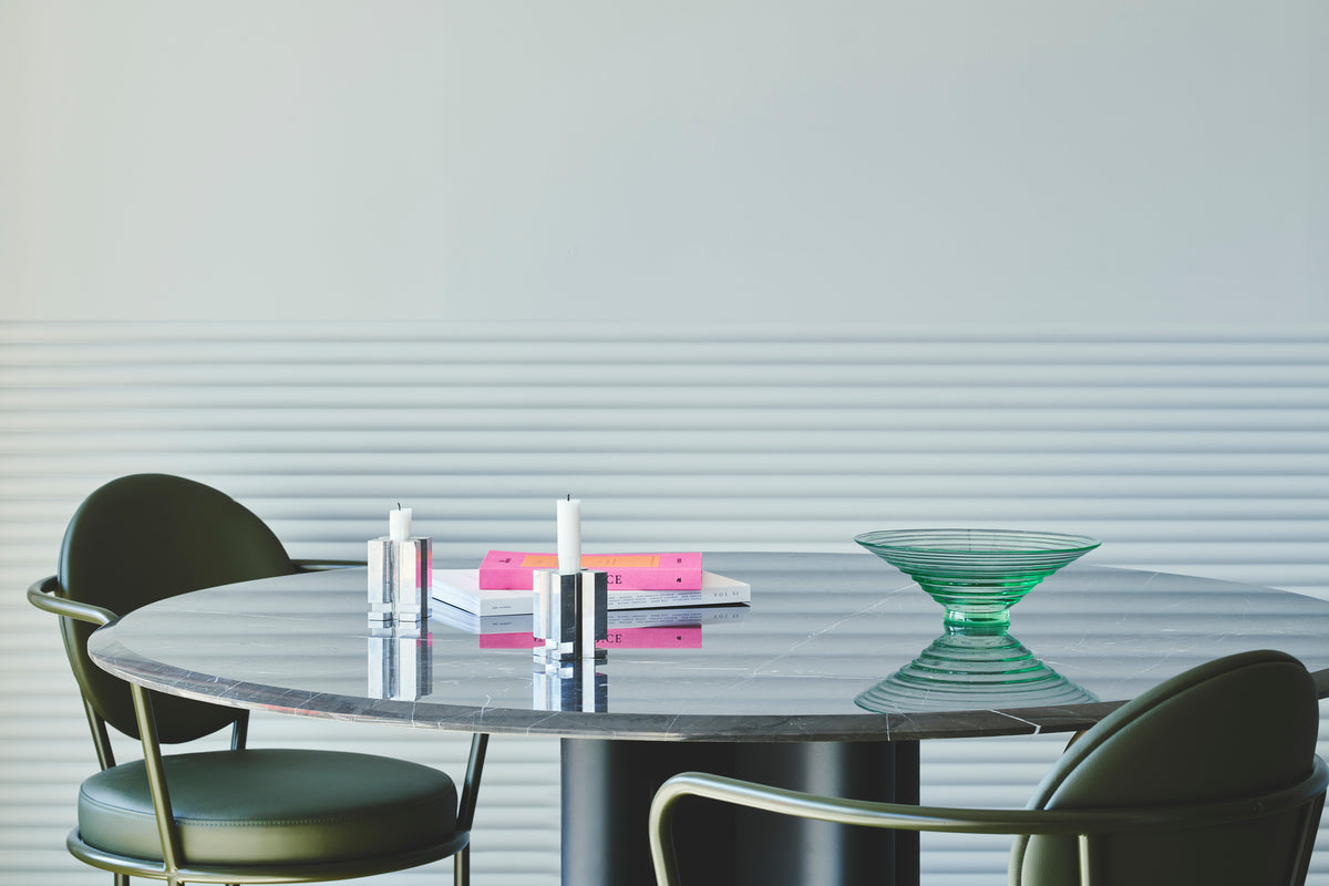 Casablanca Chairs with black frame around a dining table by Maison Burgos