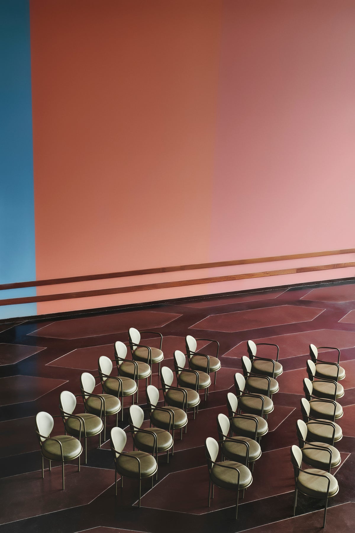 Rows of Casablanca Chairs in an event space by Maison Burgos