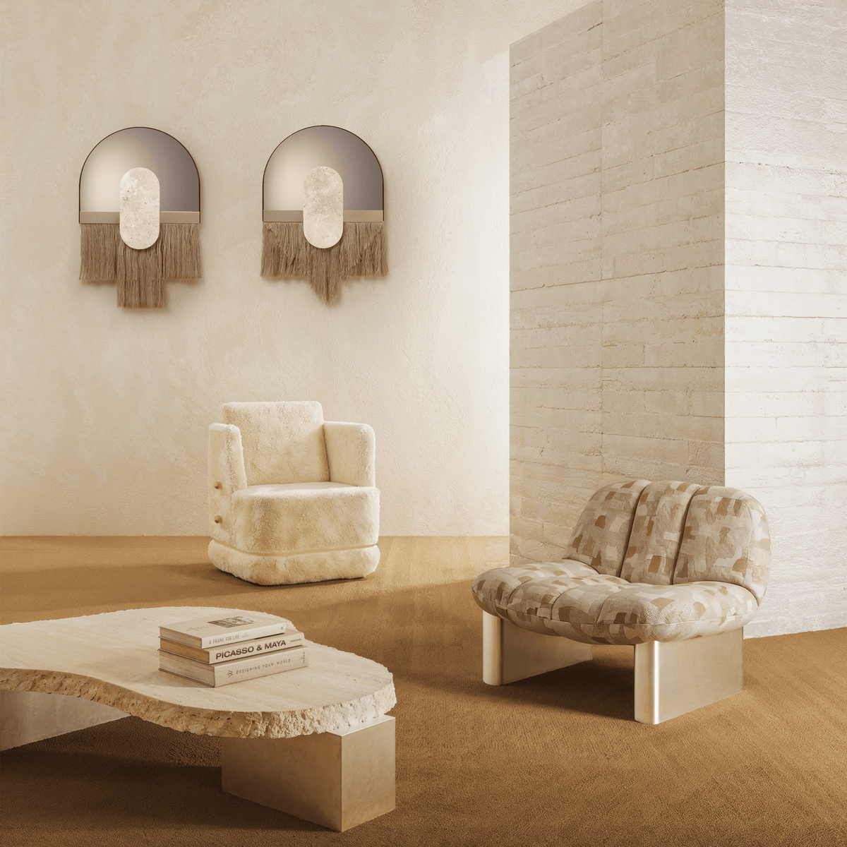 Colin Armchair in pale patterned fabric in a cream room with fringed wall mirrors