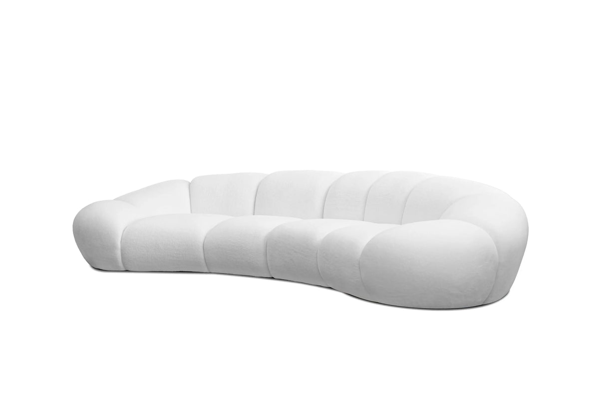 Cirro Sofa - 4-Seater in Polar White, three-quarter view of curved sofa