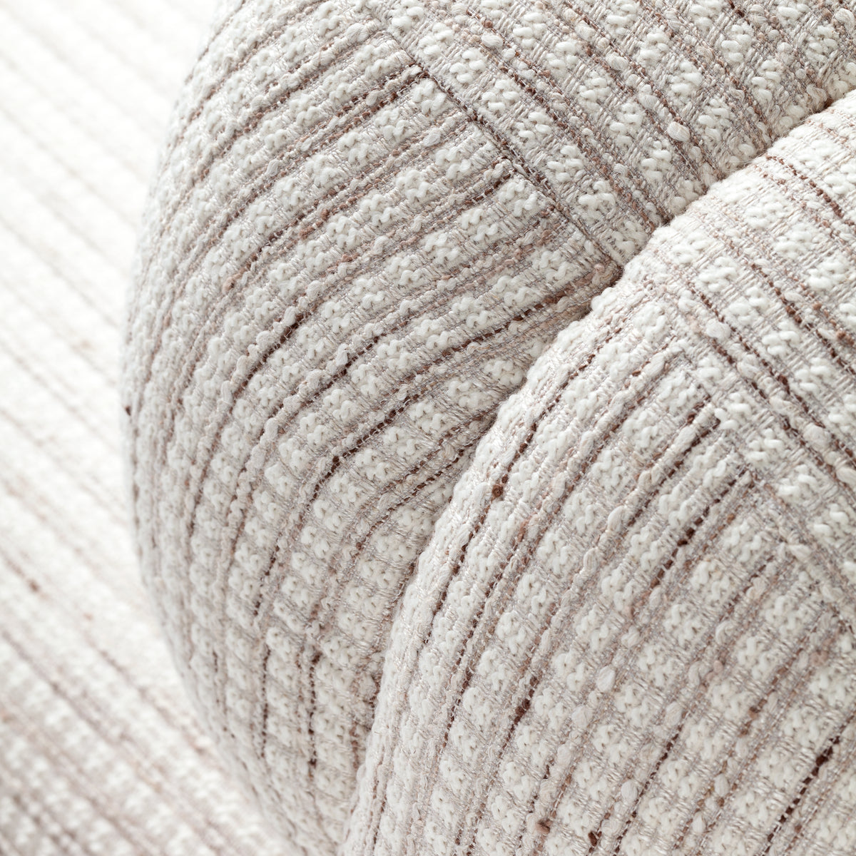 Mood Armchair close-up of the textured striped fabric folds