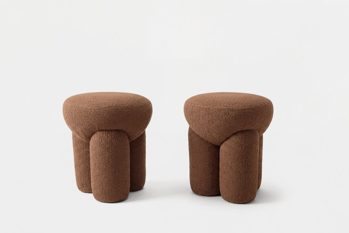Douglas Ottoman pair in rust brown bouclé