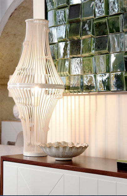 Douro Panel in Jade glazed tiles behind a white sculptural lamp