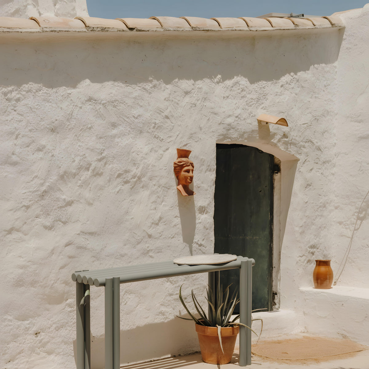 Duna Outdoor Console in a garden setting by Maison Burgos