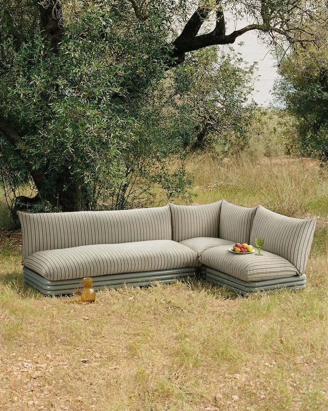 Duna Outdoor Modular Couch in a garden setting by Maison Burgos