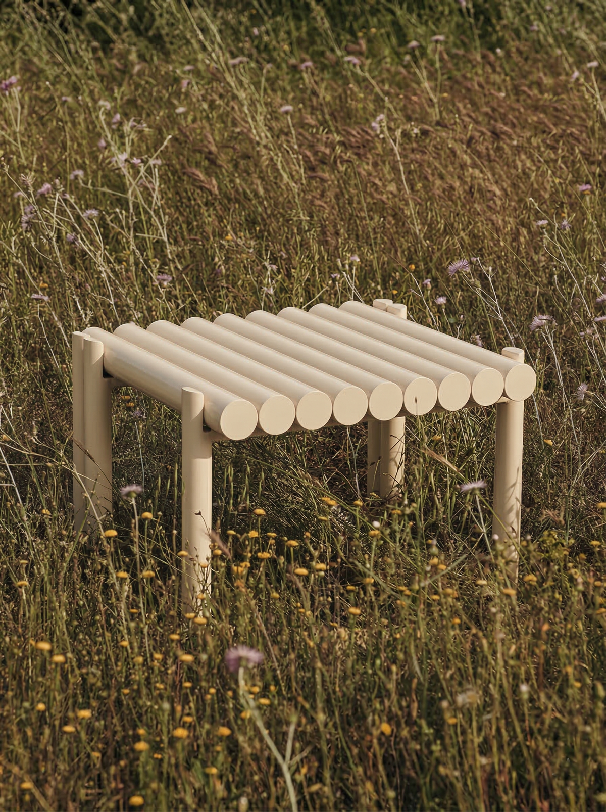 Duna Outdoor Side Table in a garden setting by Maison Burgos