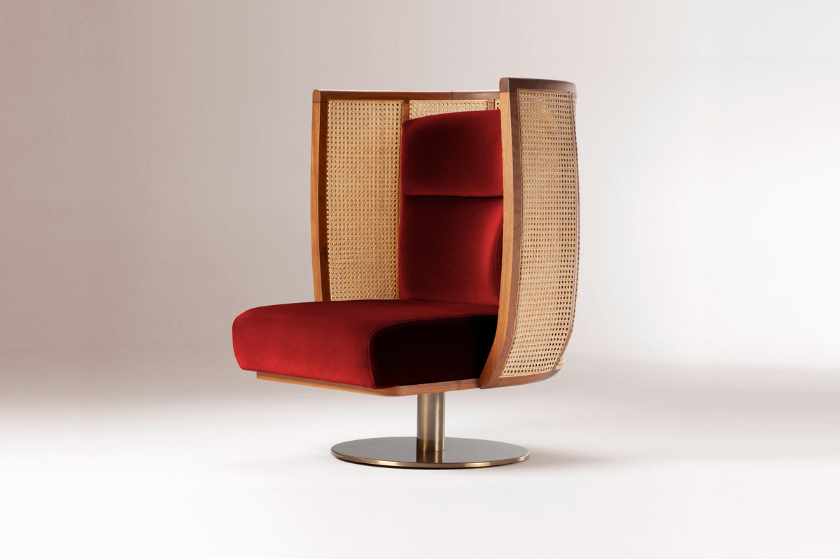 Egoista Armchair in deep red velvet with cane wings, three-quarter view