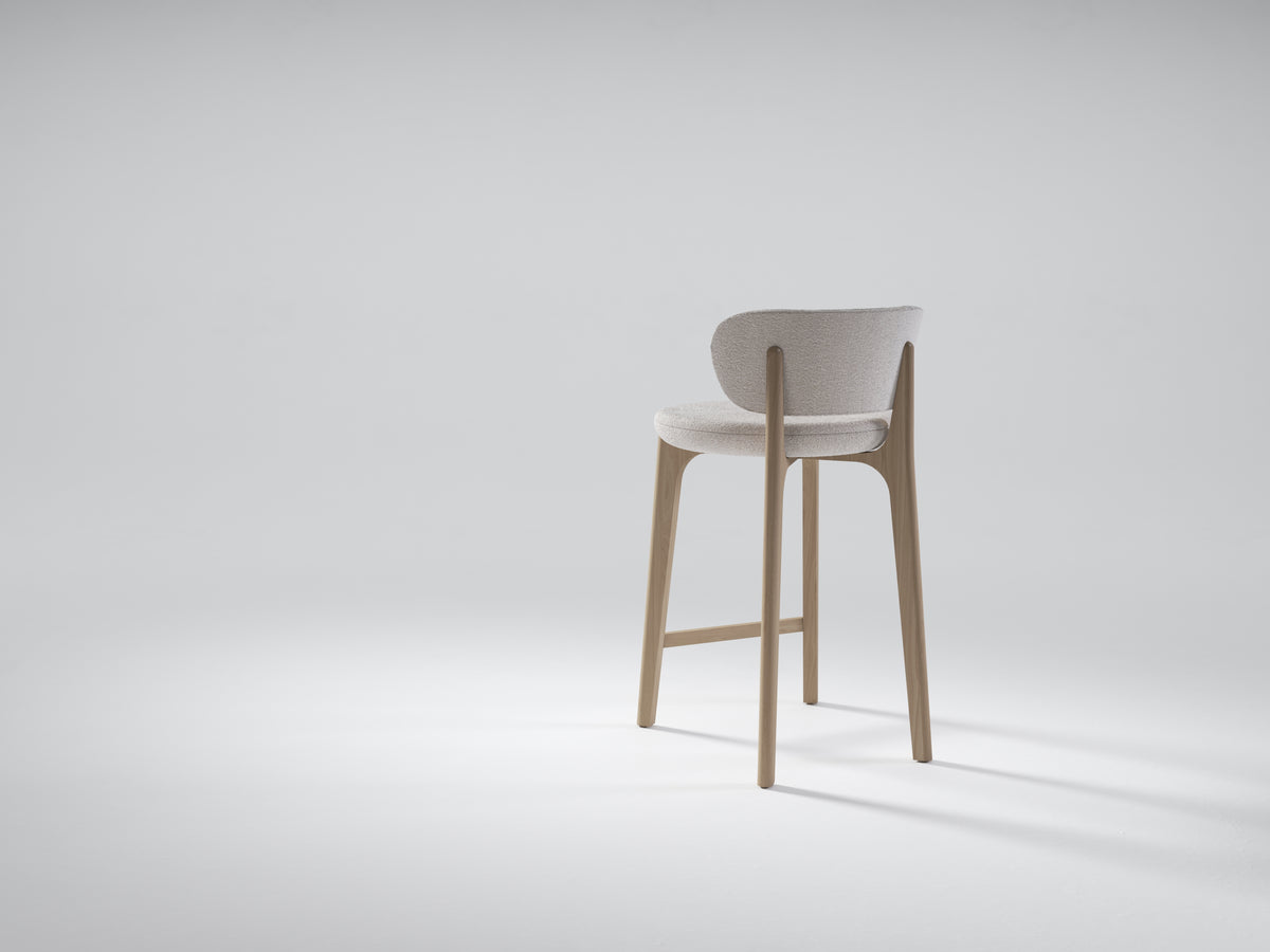 Richmond Bar Stool with taupe upholstered seat and oak frame, three-quarter view