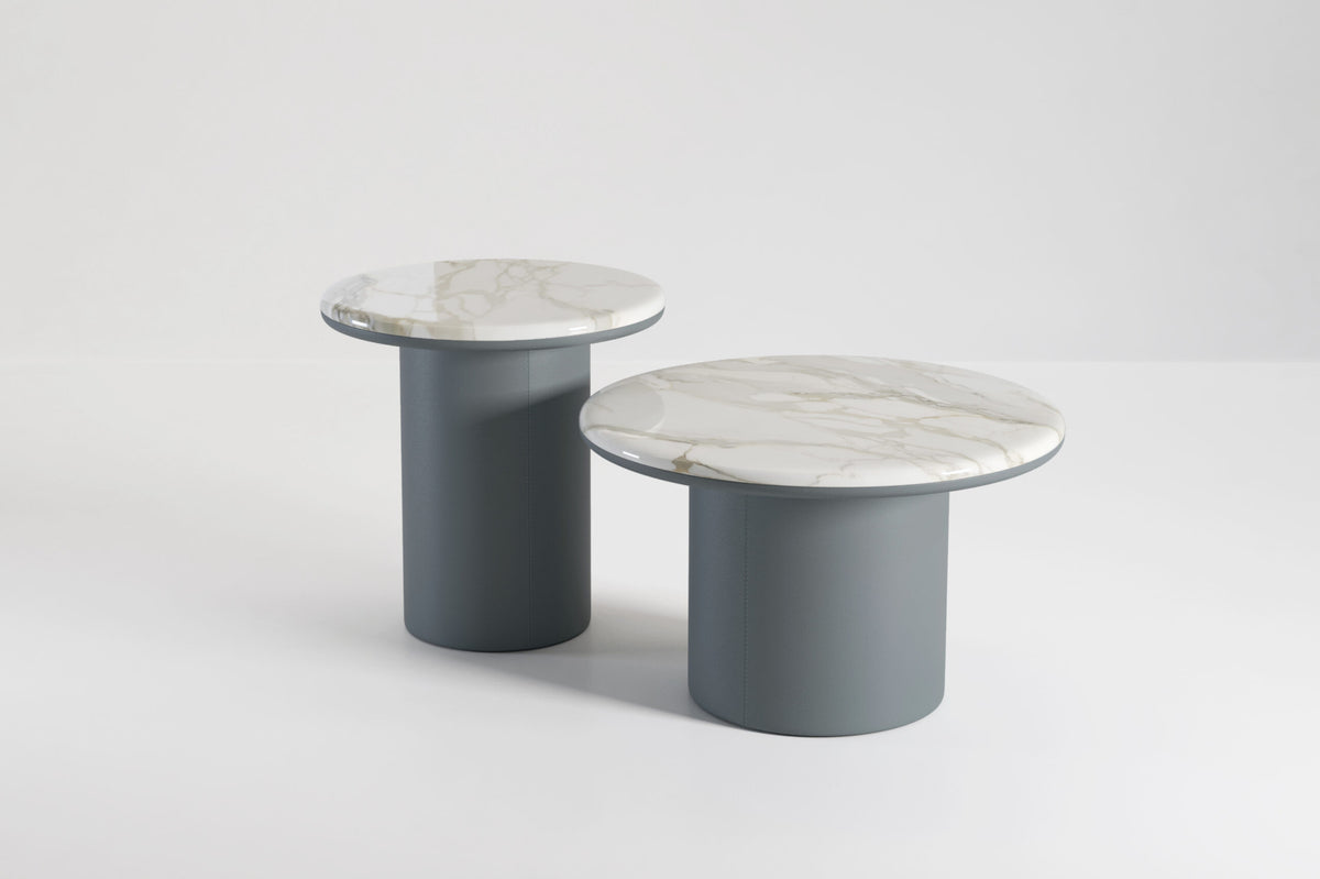Gemini Round Side Tables pair on a grey backdrop