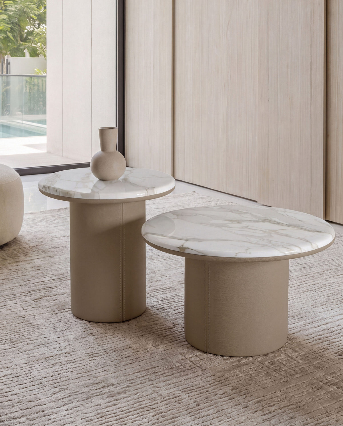 Gemini Round Side Tables with beige bases in a living room