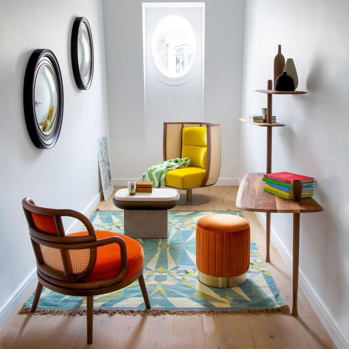 Havana Armchair in orange velvet in a narrow sitting room with yellow chair