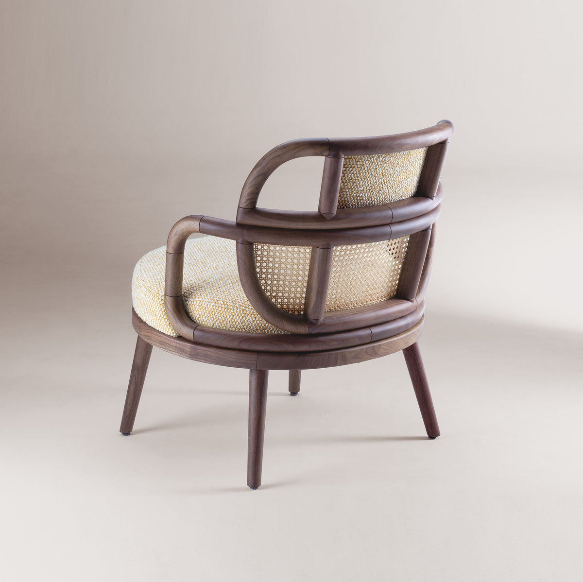 Havana Armchair rear three-quarter view showing cane back panel