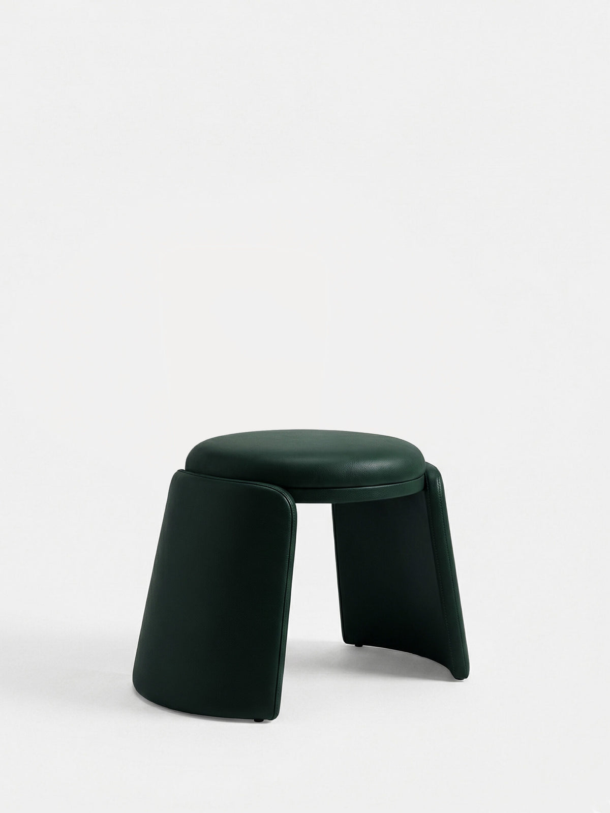 Inge Pouf in dark green leather, front view