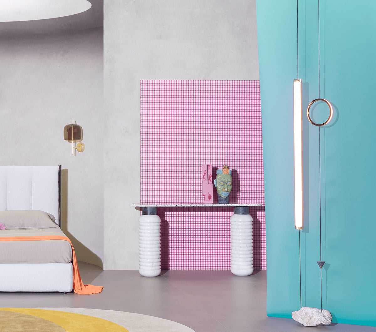 Jean Console Table in white marble in a colourful room with pink tiles and a teal curtain