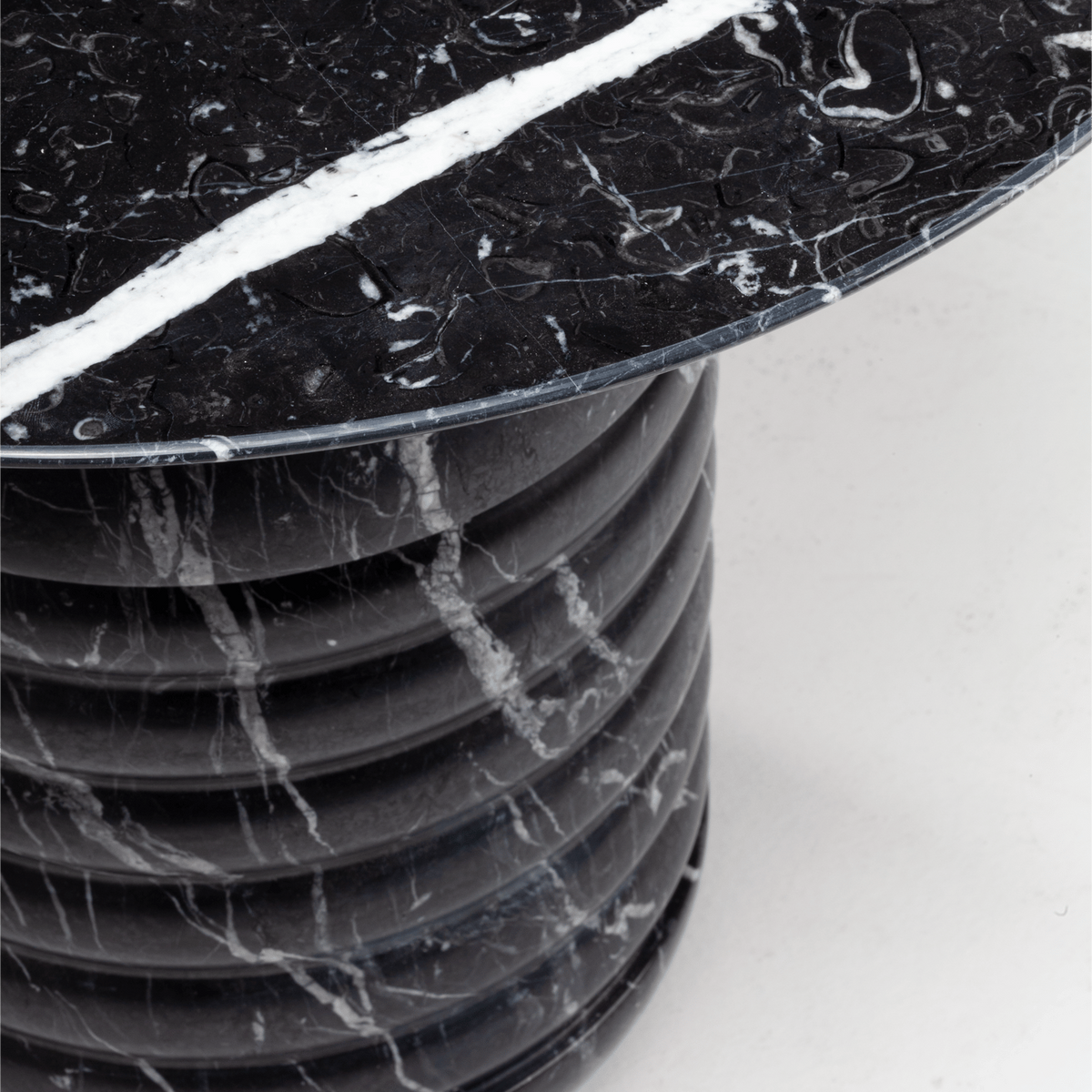 Jean Side Table close-up of Nero Marquina ribbed base with white veining