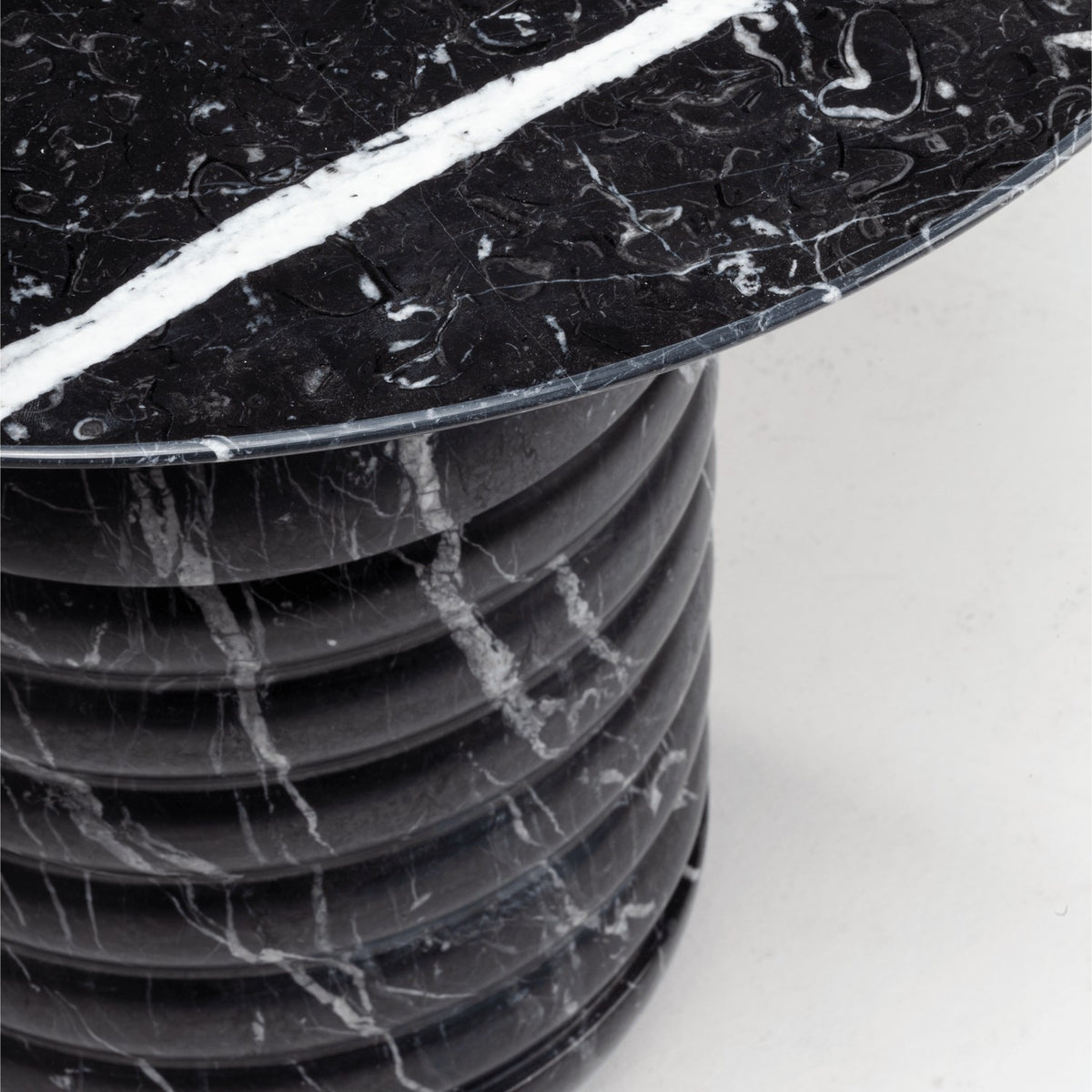 Jean Side Table close-up of Nero Marquina top and ribbed black marble base