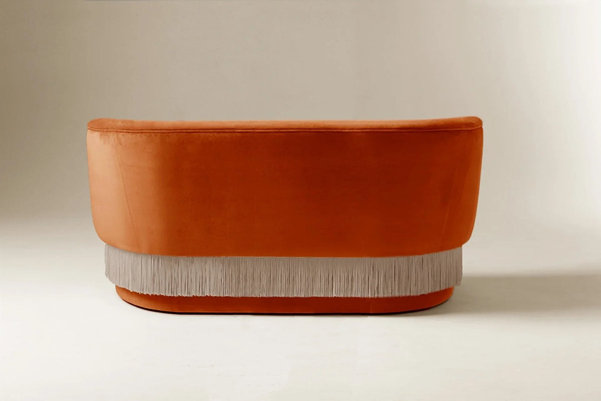 La Folie Sofa in burnt orange velvet, back view showing the rounded shell