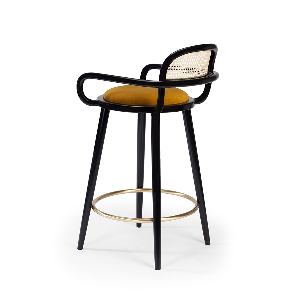 Luc bar chair in black with mustard seat, three-quarter view