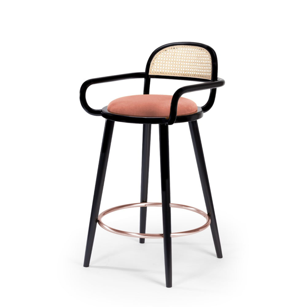 Luc bar chair with pink seat, black frame, rattan back and copper footring